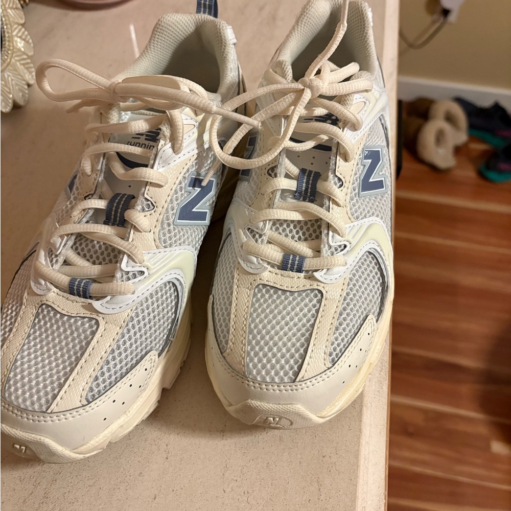 New Balance Beige and Navy Athletic Shoes